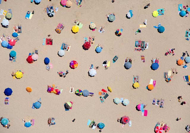 overhead beach pic with umbrellas